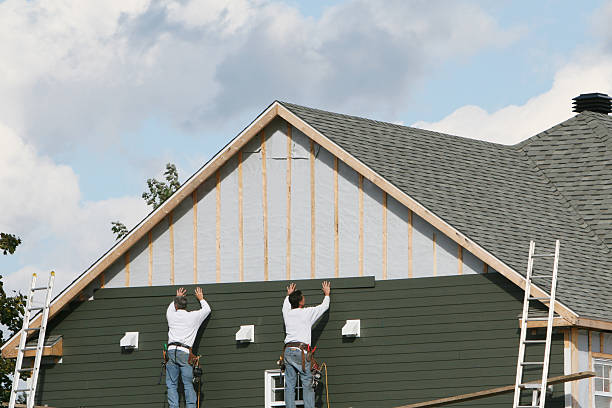 Professional Siding Installation technician working in Valrico, FL